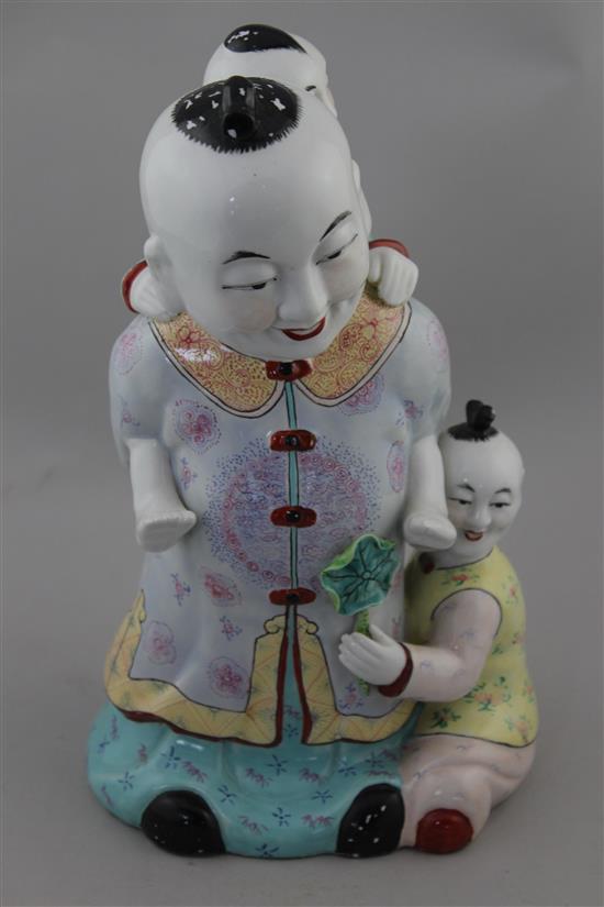 A Chinese enamelled porcelain group of boys, 20th century, 31cm